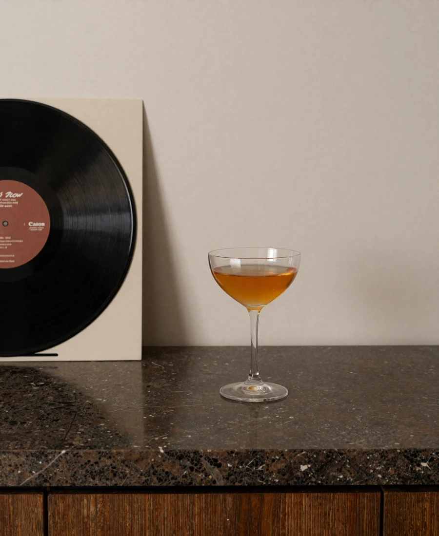 Cocktail and vinyl on a marble bar - a New York listening-bar meetup for verified Club members
